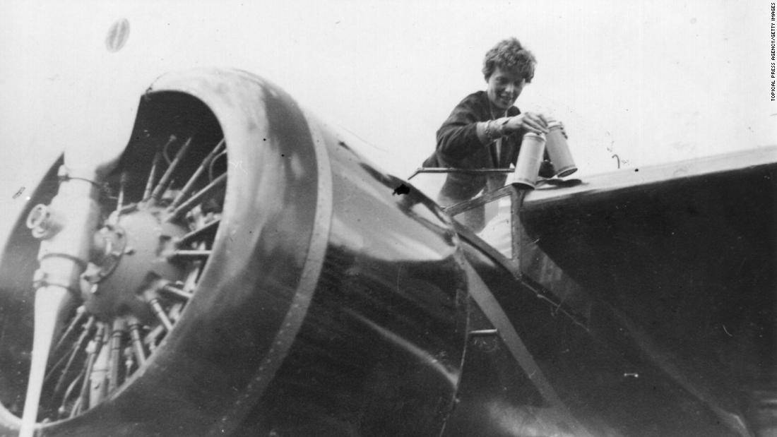 Earhart is seen in the cockpit of her single-engine Lockheed Vega 5B. Earhart was born in 1897 in Atchison, Kansas. She learned to fly after she was inspired by an airplane ride at an air show in 1920. She was the 16th woman to receive a pilot&#39;s license from the Federation Aeronautique Internationale.