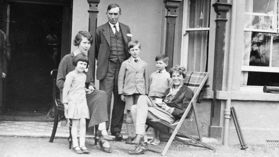 Earhart poses with the Gallagher family in Londonderry on May 24, 1932. Earhart landed her plane in the family&#39;s field after her solo flight across the Atlantic.