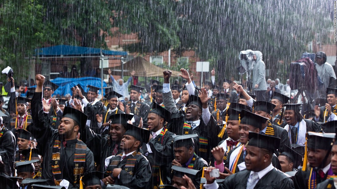 Graduates cheering the President during a heavy downpour at Morehouse College in Atlanta, Georgia, on May 19, 2013. 
