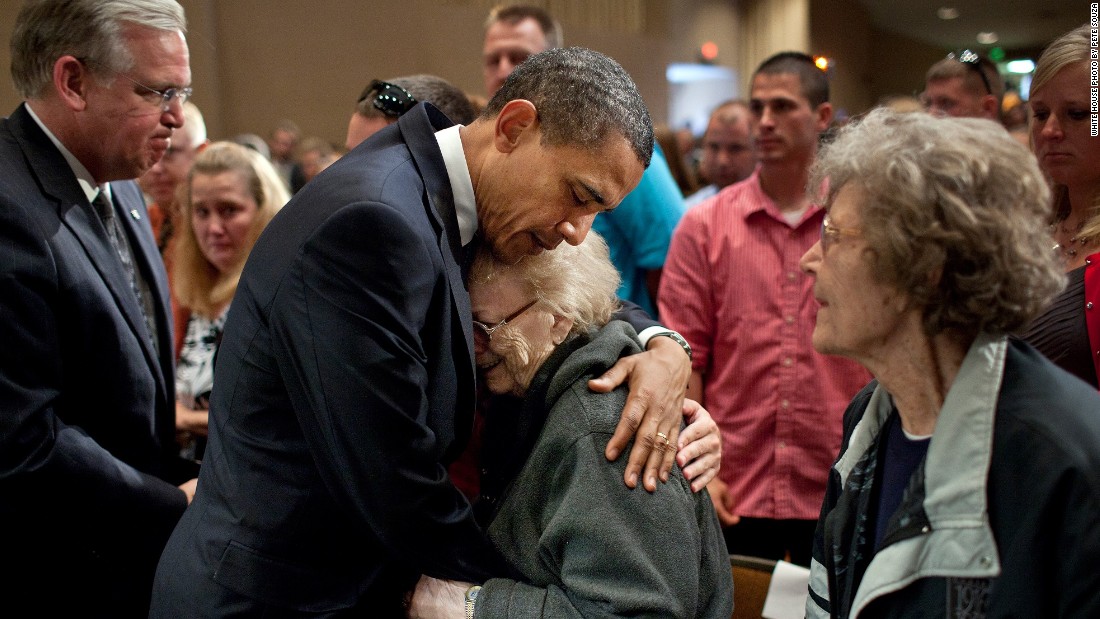 Consoling families affected by the deadly tornadoes in Joplin, Missouri, on May 29, 2011. 