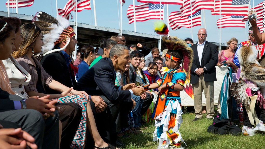 Greeting a young boy during a Flag Day celebration on June 13, 2014, at the Standing Rock Sioux Tribe Reservation in Cannon Ball, North Dakota. Cannon Ball is south of Bismarck. 