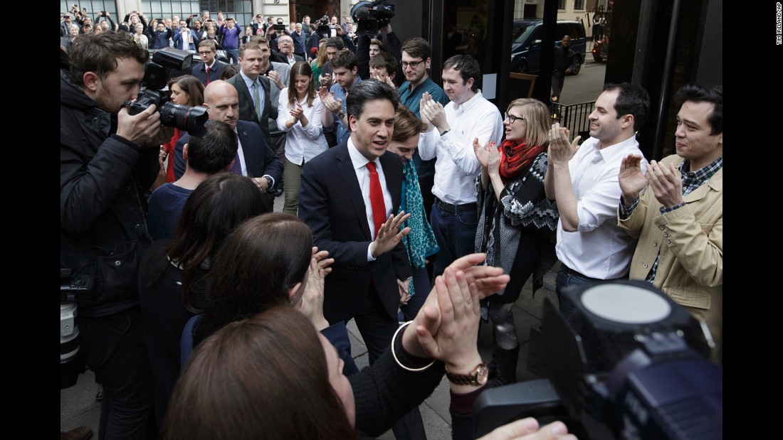 Labour Party leader Ed Miliband arrives with his wife Justine at the Labour Party headquarters in London on May 8. Miliband retained his seat during the election but said it was a &quot;clearly disappointing night.&quot;