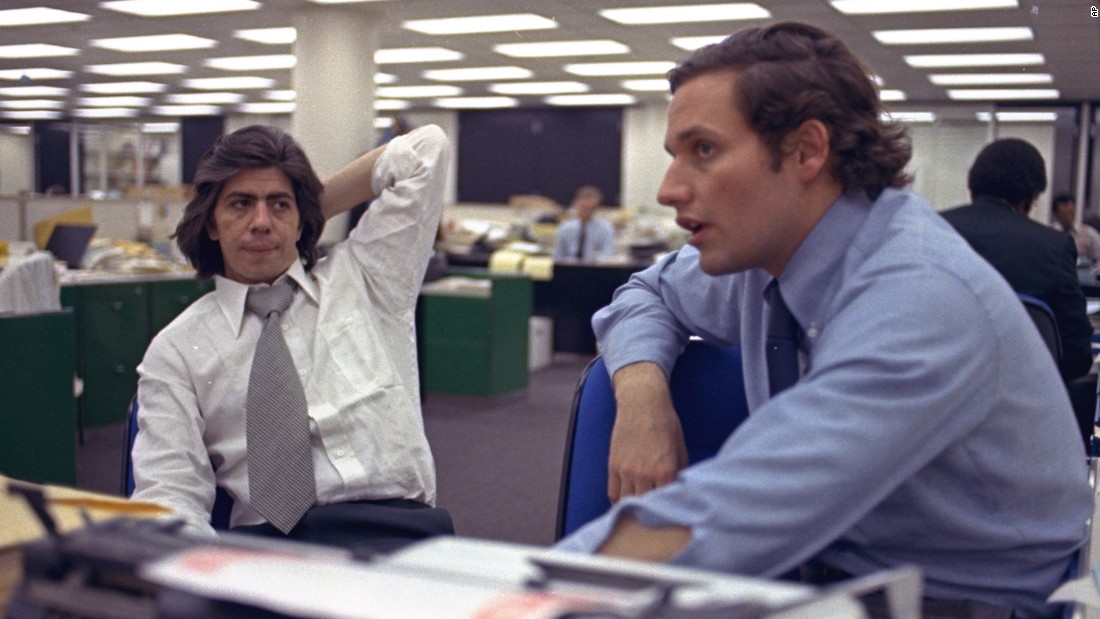 Reporters Bob Woodward, right, and Carl Bernstein sit in the newsroom of the Washington Post newspaper in May 1973. Woodward and Bernstein&#39;s reporting on the Watergate scandal led to President Nixon&#39;s resignation and won them a Pulitzer Prize. In 1976, Robert Redford and Dustin Hoffman would portray the pair in the film adaptation of their book &quot;All the President&#39;s Men.&quot;