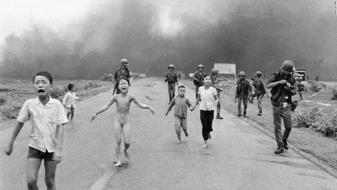 Associated Press photographer Nick Ut photographed terrified children running from the site of a napalm attack during the Vietnam War in June 1972. A South Vietnamese plane accidentally dropped napalm on its own troops and civilians. Nine-year-old Kim Phuc, center, ripped off her burning clothes while fleeing. The image communicated the horrors of the war and contributed to the growing anti-war sentiment in the United States. After taking the photograph, Ut took the children to a hospital.