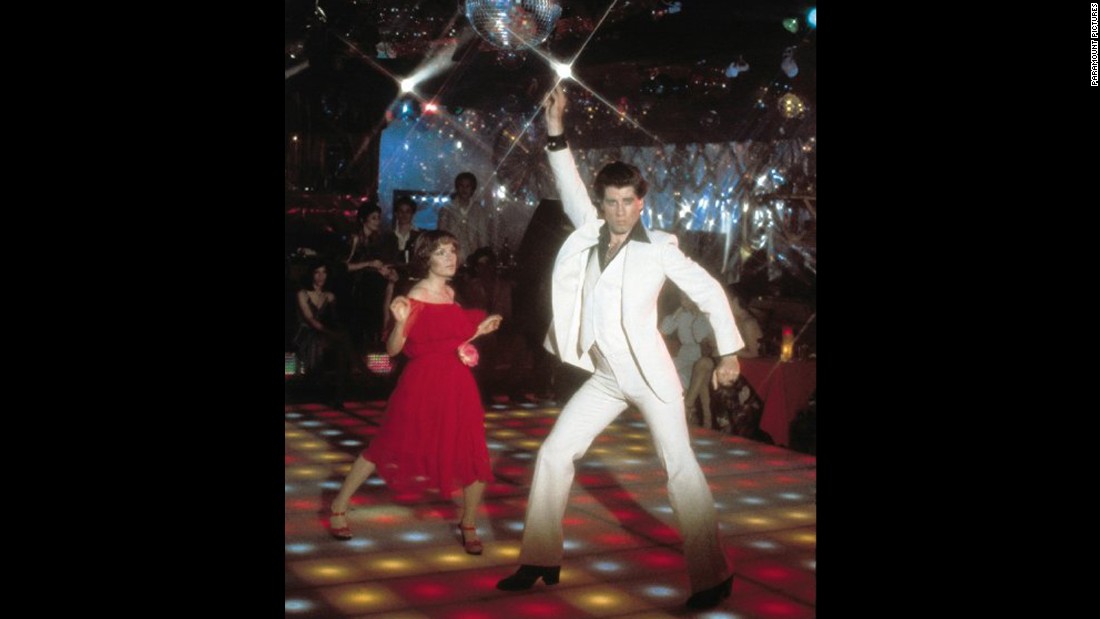 Disco music sweeps the nation with the 1977 film &quot;Saturday Night Fever&quot; starring John Travolta. Catapulted by a soundtrack containing five No. 1 singles -- including &quot;Staying Alive&quot; and &quot;Night Fever&quot; -- the film became a huge commercial success. The soundtrack stayed on top of the album charts for six months, and Travolta earned an Academy Award nomination for Best Actor. 