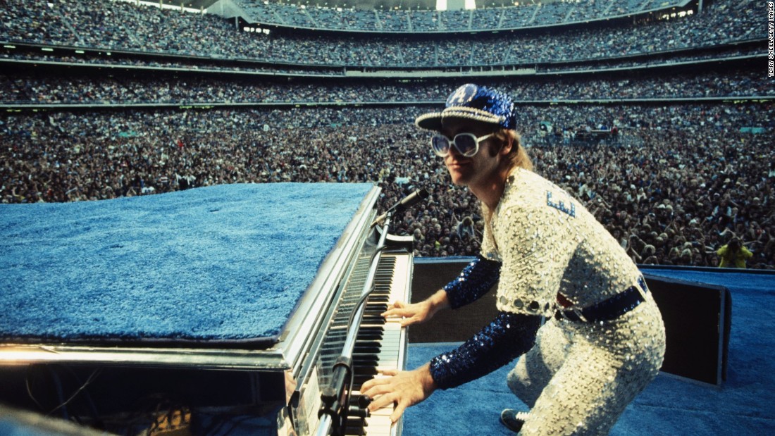 English singer Elton John, one of the biggest artists of the &#39;70s, performed two sold-out shows at Los Angeles&#39; Dodger Stadium in October 1975, performing for more than three hours each night. John, known for his flamboyant outfits and oversized sunglasses, was decked out for the occasion in a sequined Dodgers baseball uniform.