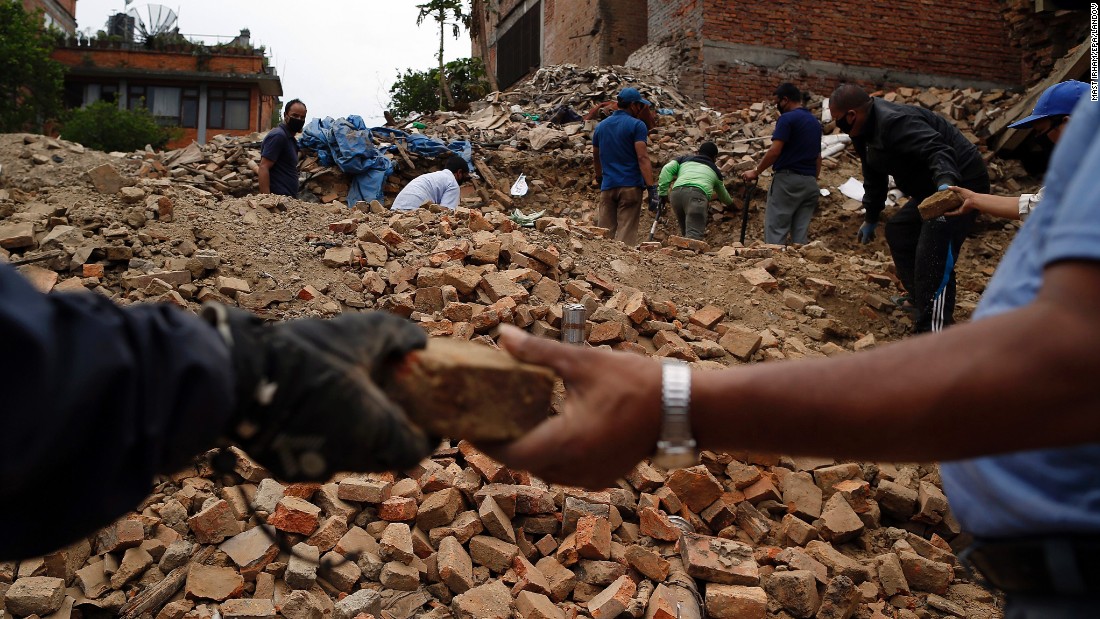 People collect bricks from the ruins of buildings in Bhaktapur, Nepal, on Friday, May 15. The region was struck with a magnitude-7.3 earthquake on Tuesday, May 12, just 17 days after a &lt;a href=&quot;http://www.cnn.com/2015/04/25/world/gallery/nepal-earthquake/index.html&quot; target=&quot;_blank&quot;&gt;magnitude-7.8 quake&lt;/a&gt; left thousands dead.