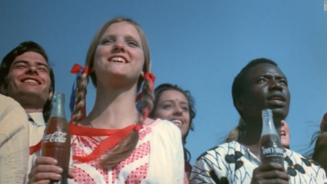 In July 1971, the McCann Erickson advertising agency debuted its &quot;Hilltop&quot; spot for Coca-Cola and made advertising history. In the ad, young people from many nations sing that they&#39;d &quot;like to buy the world a Coke and keep it company.&quot; The song was commissioned for Coke but crossed over and became a bona fide pop hit: A version reached No. 7 on the Billboard Hot 100 chart on January 15, 1972.