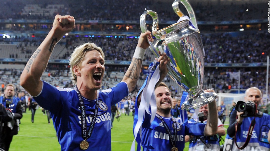 The match finished 1-1 after extra-time, with striker Didier Drogba scoring the winning penalty in the shootout. Here, Spaniards Fernando Torres (left) and Juan Mata celebrate with the trophy. Both have since left the club.
