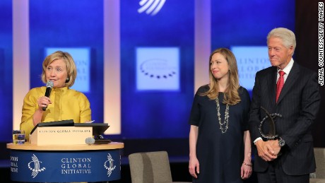 Former U.S. Secretary of State Hillary Clinton, vice-chair of the Clinton Global Initiative Chelsea Clinton and founder of the Clinton Global Initiative Bill Clinton onstage during the fourth day of the Clinton Global Initiative&#39;s 10th Annual Meeting at the Sheraton New York Hotel &amp; Towers on September 24, 2014 in New York City. 