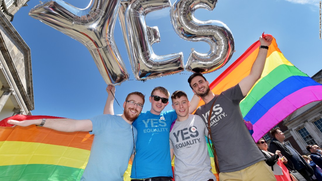 Supporters in favor of same-sex marriage pose for a photograph as thousands gather in Dublin Castle square awaiting the referendum&#39;s outcome on May 23.