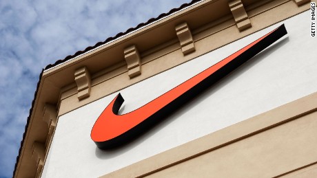 The  &quot;Swoosh&quot; logo is seen on a Nike factory store on December 12, 2009 in Orlando, Florida.