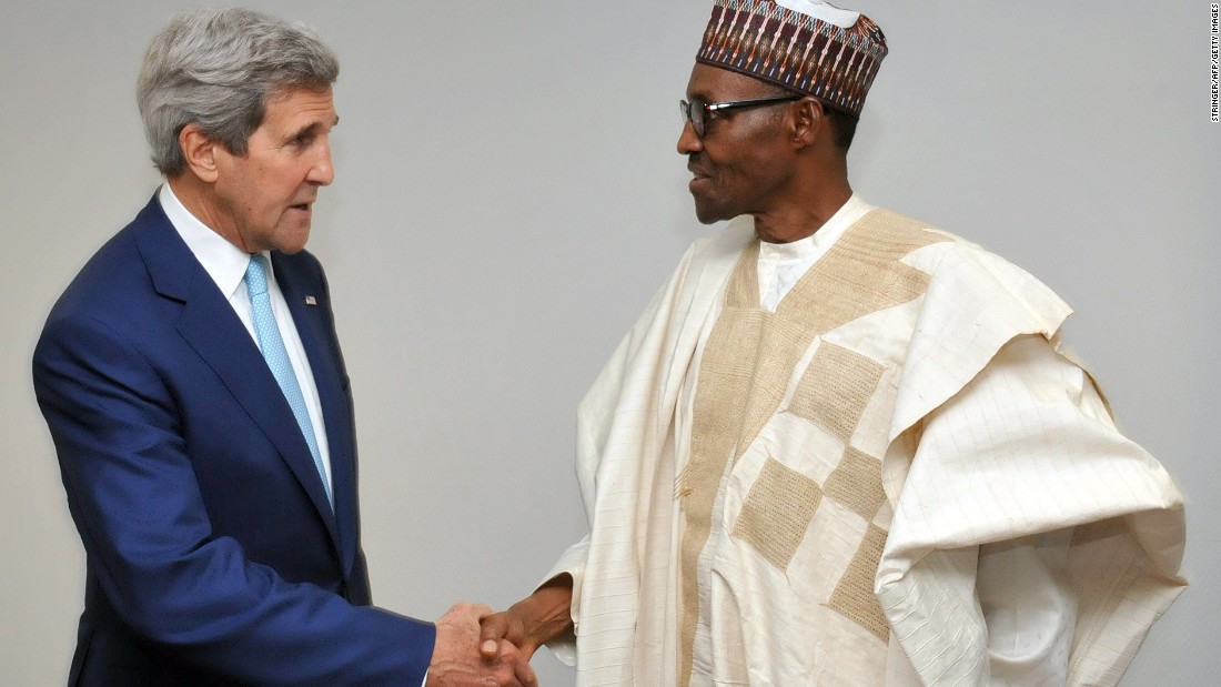 U.S. Secretary of State John Kerry shakes hands with Nigerian President Muhammadu Buhari on Wednesday, May 29, shortly after Buhari&#39;s inauguration in Abuja, Nigeria.