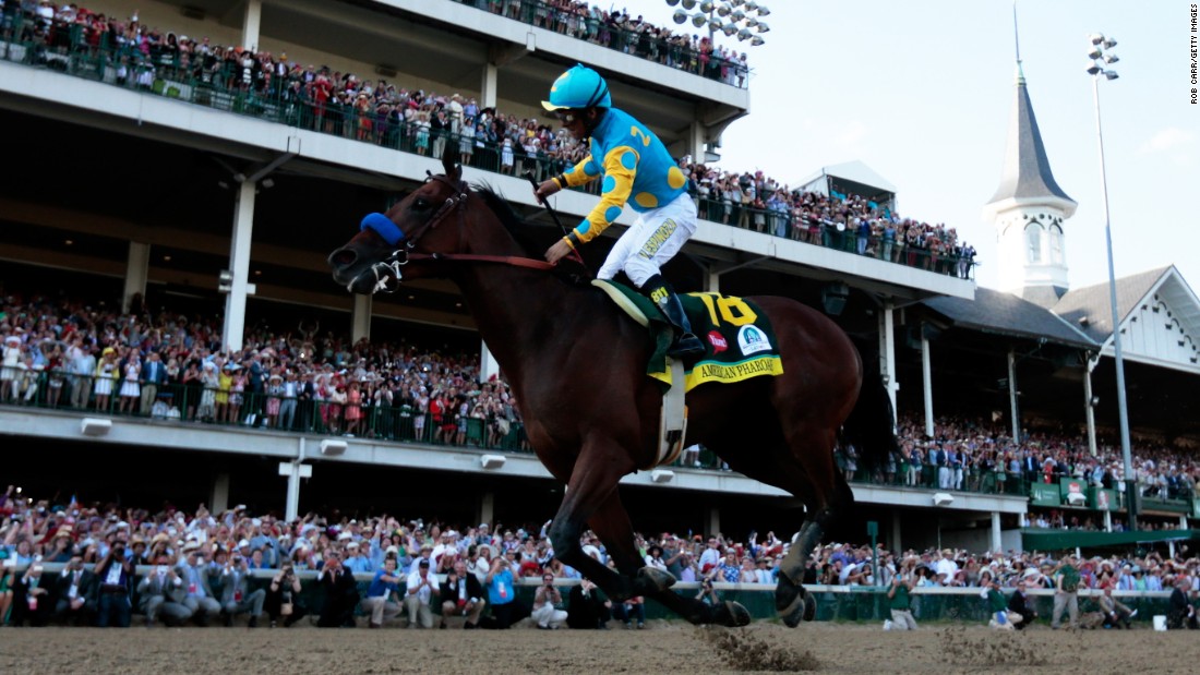 MAY 2 2015: The start of an amazing year for American Pharoah and his team. Jockey Victor Espinoza, celebrates his second successive Kentucky Derby after being victorious on board California Chrome 12 months earlier.