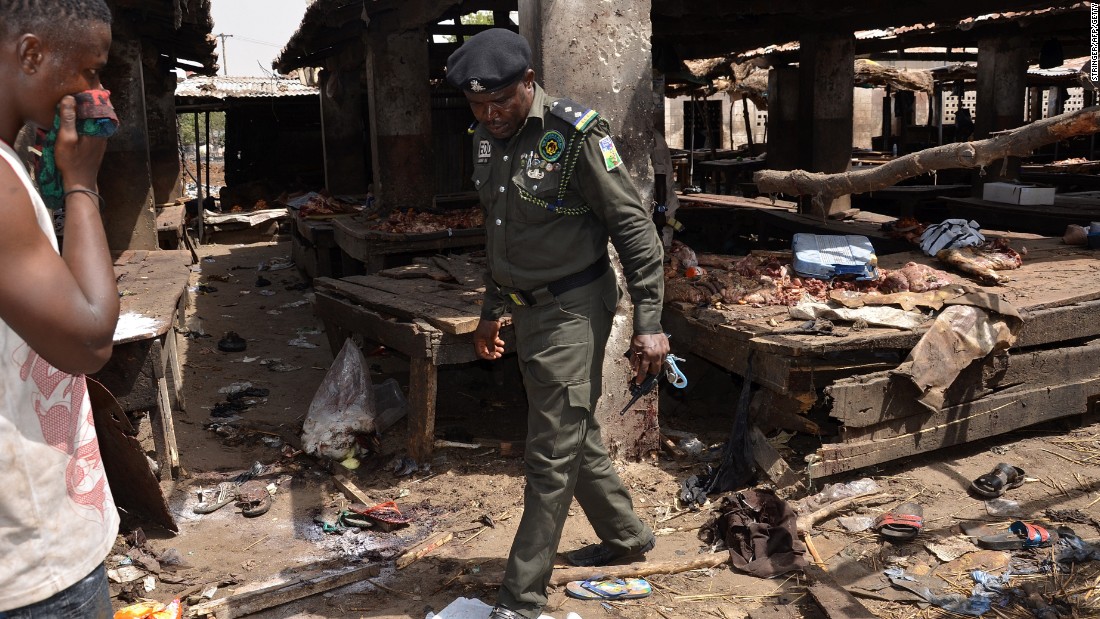 A Nigerian policeman inspects the site of a suicide attack by Boko Haram at a busy cattle market in the northeastern Nigerian city of Maiduguri in June, 2015. Boko Haram overtook ISIS as the world&#39;s deadliest terror group last year, according to the Global Terrorism Index, while Nigeria had the biggest year-on-year increase in terrorism, with deaths up more than 300%.