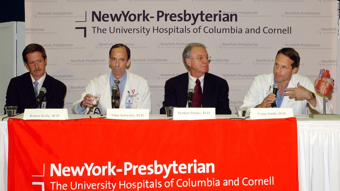 Dr. Craig Smith, right, answers a reporter&#39;s question about Clinton&#39;s health after Clinton had quadruple bypass surgery in September 2004. Clinton was hospitalized after suffering chest pains and shortness of breath. Doctors announced that some of Clinton&#39;s arteries had been blocked more than 90%.