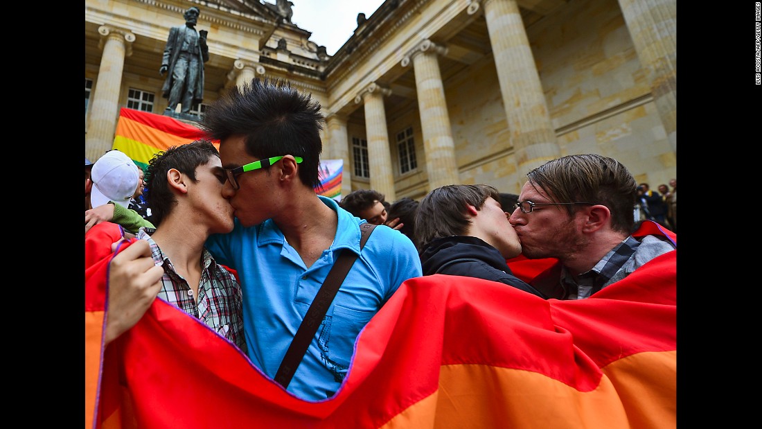 Same-sex couples kiss during a protest by the LGBT community at the Bolivar Square in Bogota,Colombia, in November 2012.