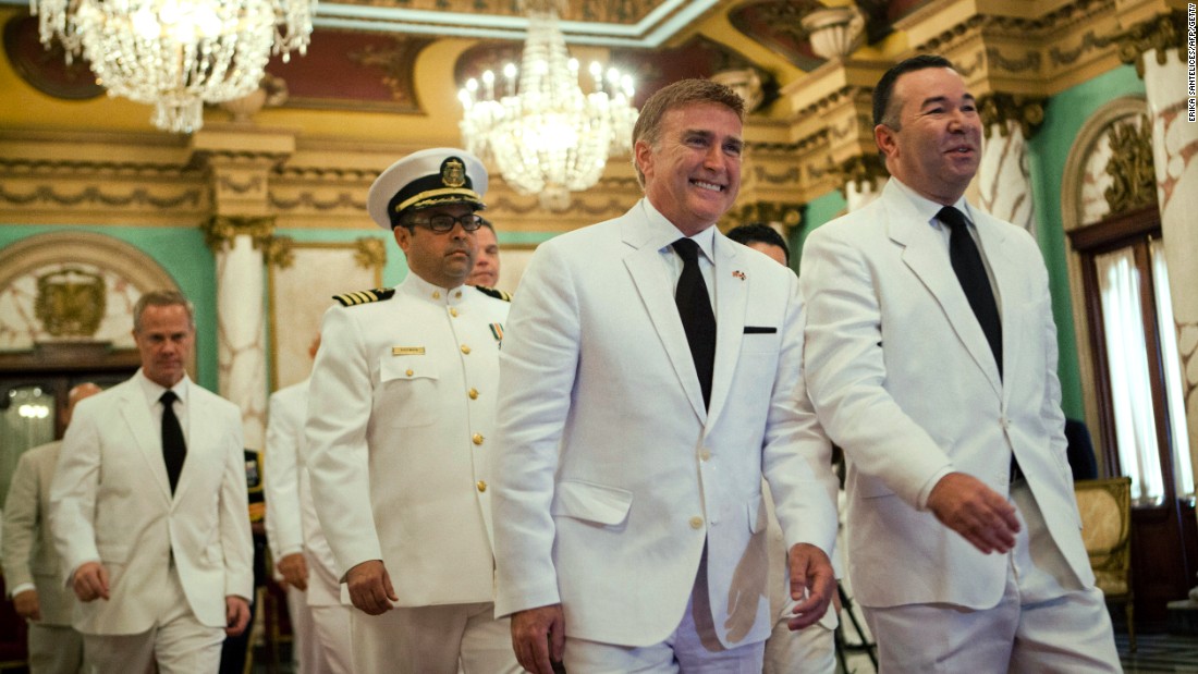 U.S. Ambassador to the Dominican Republic and gay rights activist James Brewster, center, arrives to present his credentials to Dominican President Danilo Medina in December, 2013, during a ceremony at the National Palace in Santo Domingo.