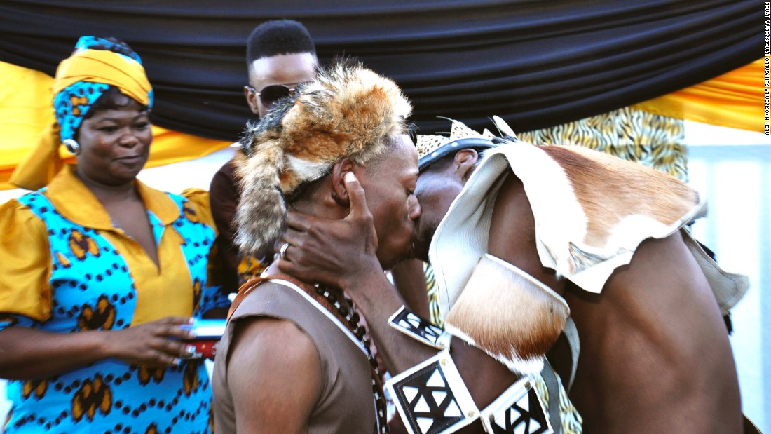 Tshepo Modisane and Thobajobe Sithole kiss at their wedding at Siva Sungum Hall in Kwadukuza, South Africa in April, 2013.