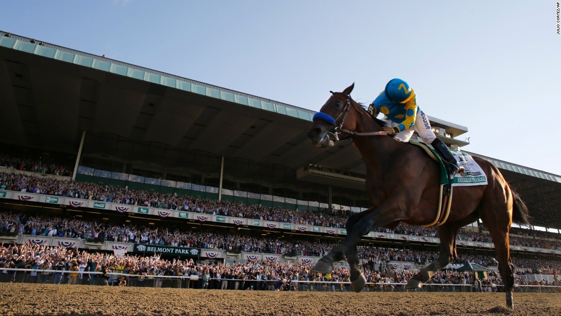 Victor Espinoza looks back after crossing the finish line. 