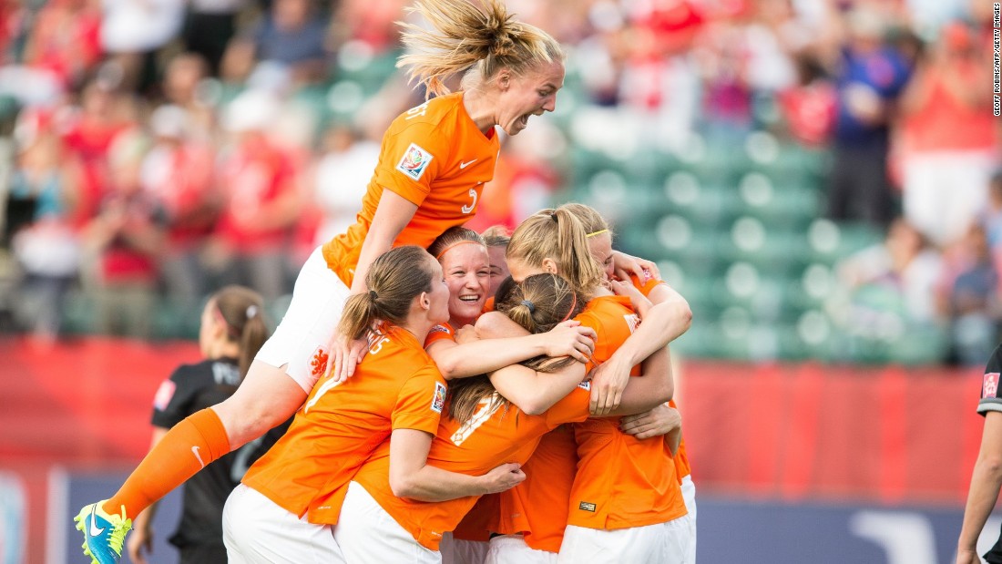 Dutch players celebrate Martens&#39; goal in the first half.