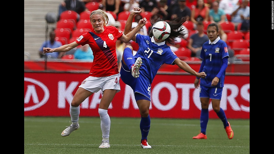 Norway&#39;s Gry Tofte Ims, left, competes against Kanjana Sung-Ngoen of Thailand.