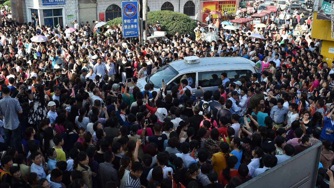 Almost 9.5 million high school students in China took the 2015 gaokao in early June. Failure potentially means no degree and poorer job prospects. In this picture, parents crowd a police car outside Maotanchang High School as students leave to sit the 2015 college entrance exam. 