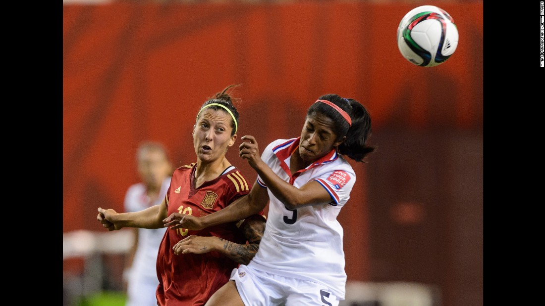 Spain&#39;s Jennifer Hermoso watches Costa Rica&#39;s Diana Saenz head the ball.