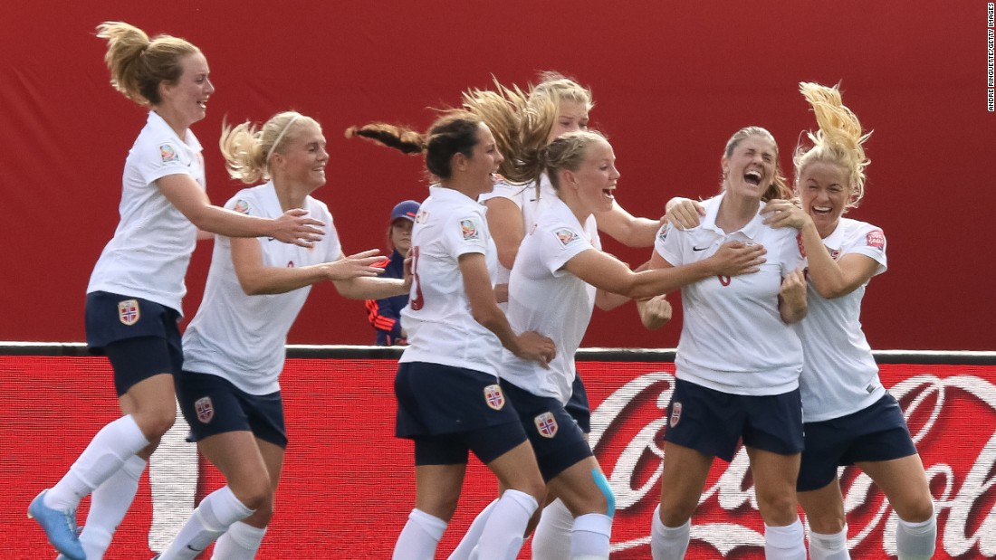 Norway&#39;s Maren Mjelde, second from right, celebrates with teammates after scoring on a free kick.