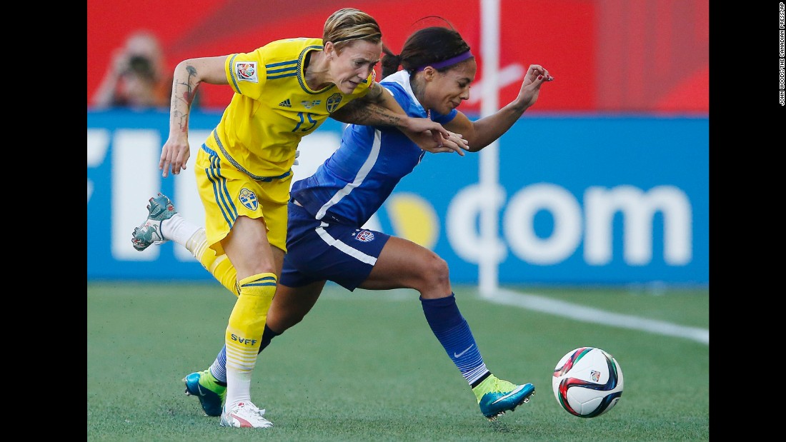Therese Sjogran of Sweden, left, and Sydney Leroux of the United States chase down a ball during their scoreless draw June 12 in Winnipeg.