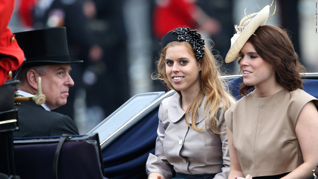 Prince Andrew, Duke of York, Princess Beatrice and Princess Eugenie arrive. 