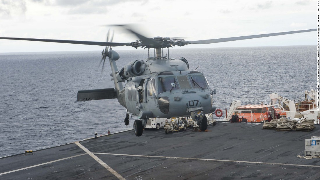 The floating hospital is equipped with an MH-60S Sea Hawk helicopter, pictured taking off from the flight deck.