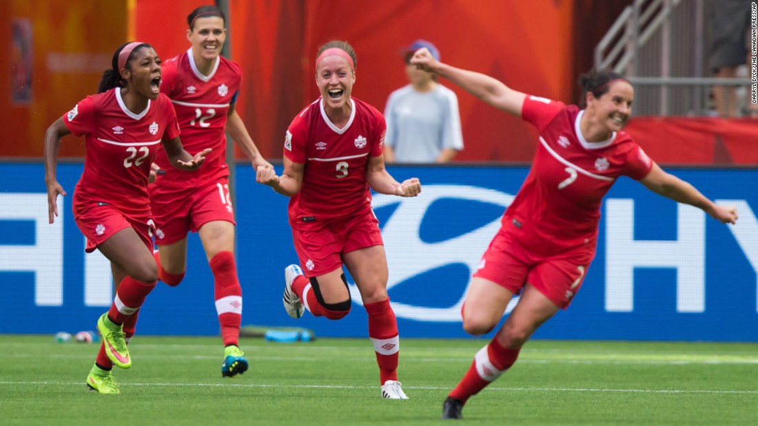 From left, Canada&#39;s Ashley Lawrence, Christine Sinclair, Josee Belanger and Rhian Wilkinson celebrate Belanger&#39;s goal against Switzerland on Sunday, June 21. Canada won the round-of-16 match 1-0 in Vancouver.