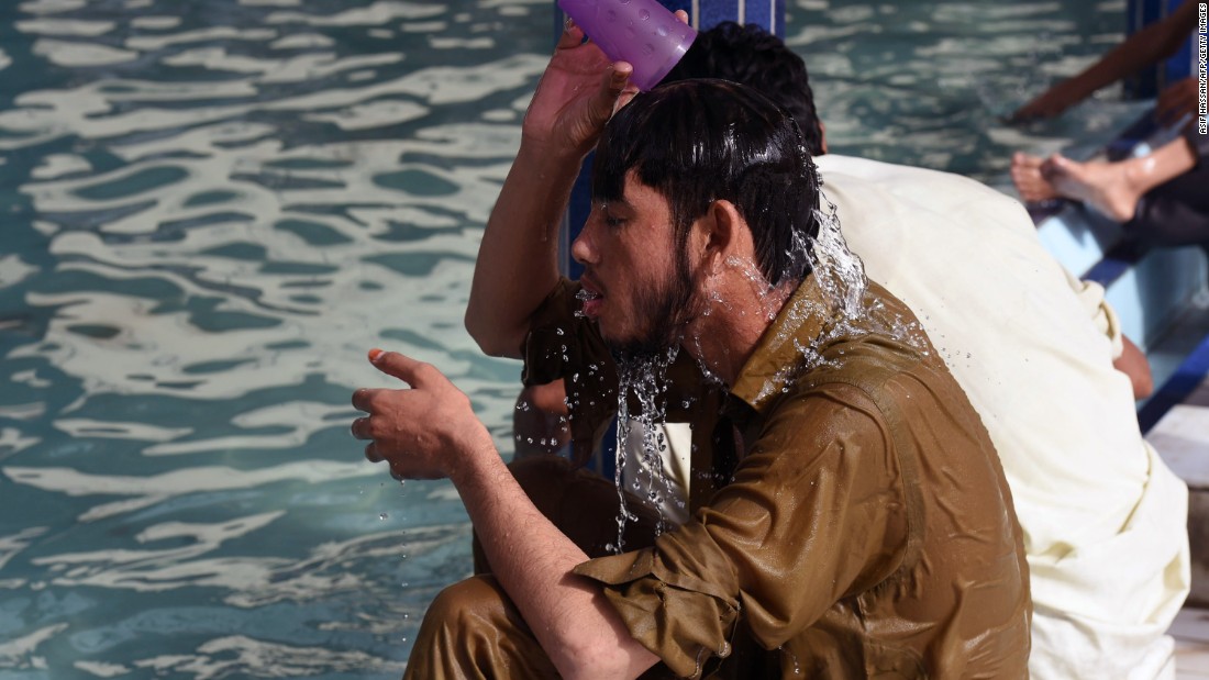 A Pakistani man cools down at a mosque during the heat wave in Karachi on June 22.