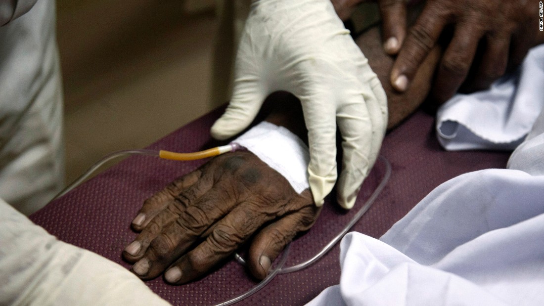 A patient suffering from heatstroke receives treatment at a Karachi  hospital on Wednesday, June 24.