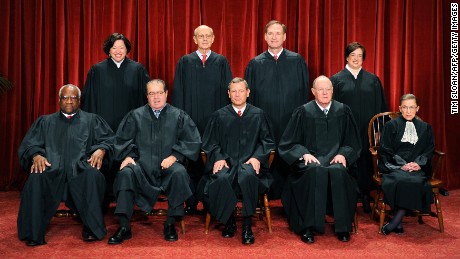 The Justices of the U.S. Supreme Court sit for their official photograph on October 8, 2010, in Washington.