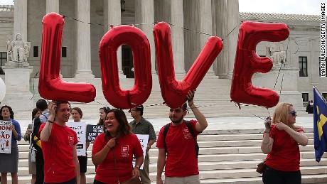 WASHINGTON, DC - JUNE 25: Supporters for and against gay marriage gather in front of the Supreme Court Building June 25, 2015 in Washington, DC. The high court is expected rule in the next few days on whether states can prohibit same sex marriage, as 13 states currently do. (Photo by Mark Wilson/Getty Images)