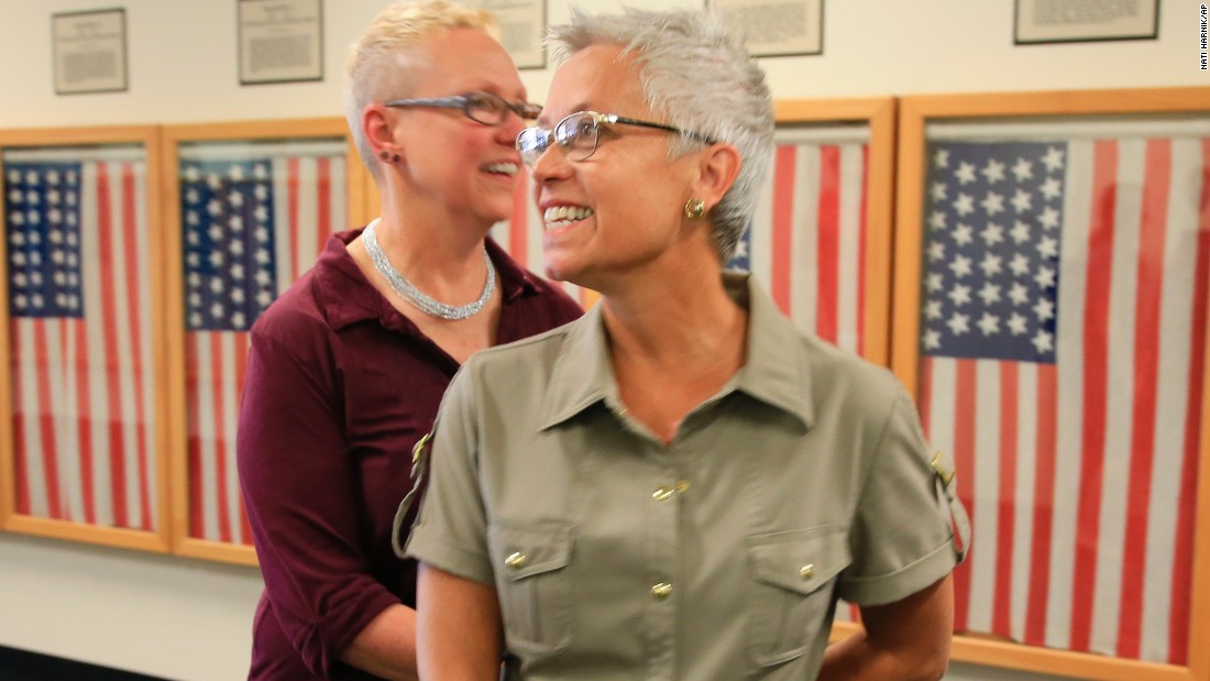 Kathy Petterson, left, and Beverly Reicks leave the Douglas County Clerk&#39;s office on June 26 after becoming the first same-sex couple to wed in Omaha, Nebraska.