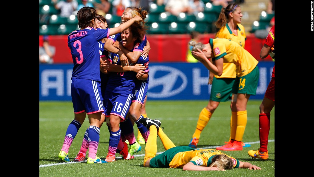 Japanese players celebrate a goal scored by Mana Iwabuchi (No. 16) during a match against Australia on June 27. It was the only goal scored in the quarterfinal match, which was played in Edmonton, Alberta.