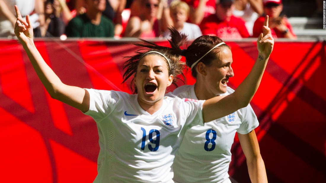 England&#39;s Jodie Taylor, left, celebrates her goal against Canada with teammate Jill Scott.
