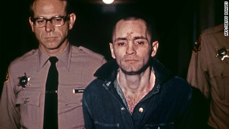 Beardless and shaven-headed, Charles Manson, is sullen faced as he goes to hear sentence of death in the gas chamber passed by the court 29 March 1971 in Los Angeles. Manson was convicted of murder, after in August 1969, during two bloody evenings of paranoid, psychedelic savagery, at least nine people were murdered among them Sharon Tate, the young and pregnant actress and wife of Roman Polanski. The trial of Manson and three girls followers similarly sentenced lasted ten months. 