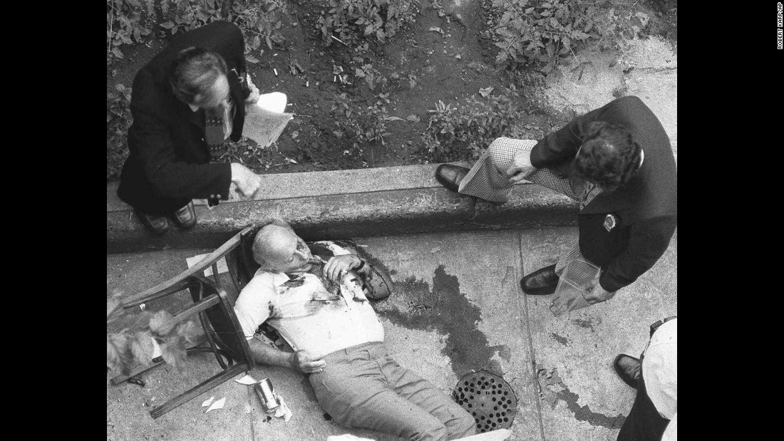 The bloodied body of mafia chieftain Carmine &quot;Lilo&quot; Galante, his final cigar still in his mouth, lies on the floor of a backyard garden in a Brooklyn restaurant July 12, 1979. Galante was gunned down along with an associate and the restaurant&#39;s owner. The killers allowed Galante&#39;s two bodyguards to leave unharmed. The murder is believed to have been part of a power struggle among New York&#39;s organized crime families.