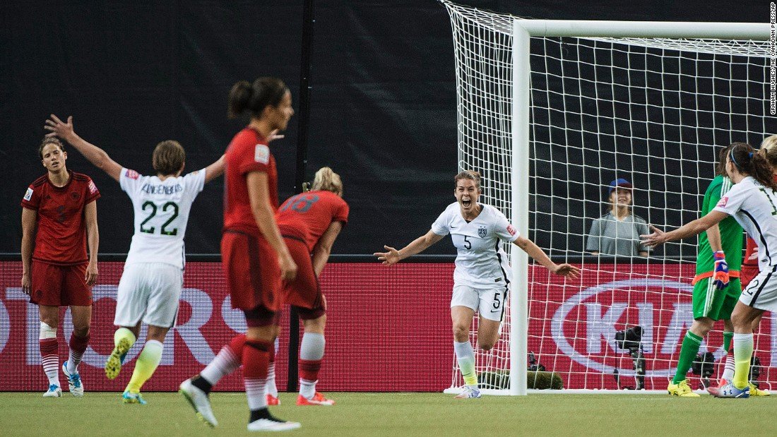 American Kelley O&#39;Hara, center in white, celebrates after scoring a goal against Germany on Tuesday, June 30. The goal, late in the second half, clinched a 2-0 semifinal victory for the Americans. They will now get a rematch against Japan, the team that defeated them in the 2011 World Cup final.