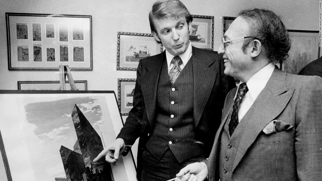 Trump stands with Alfred Eisenpreis, New York&#39;s economic development administrator, in 1976 while they look at a sketch of a new 1,400-room renovation project of the Commodore Hotel. After graduating college in 1968, Trump worked with his father on developments in Queens and Brooklyn before purchasing or building multiple properties in New York and Atlantic City, New Jersey. Those properties included Trump Tower in New York and Trump Plaza and multiple casinos in Atlantic City.