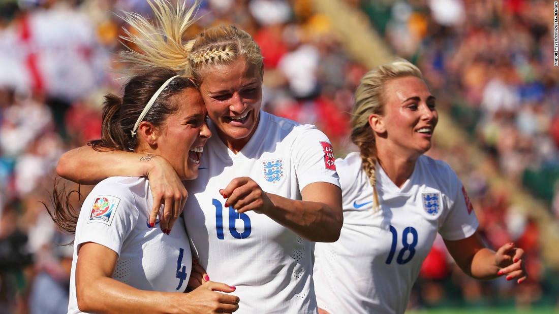 England&#39;s Katie Chapman, center, congratulates Fara Williams after Williams tied the score on a penalty kick. Both teams traded penalty-kick goals before Bassett&#39;s own goal.