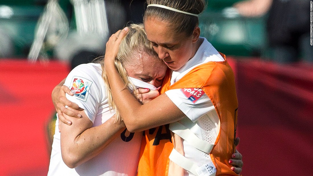England&#39;s Josanne Potter, right, consoles Bassett after the whistle.