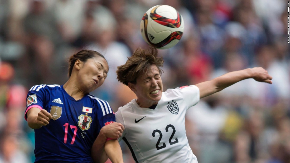 Japan&#39;s Yuki Ogimi and United States&#39; Meghan Klingenberg vie for the ball during the second half.