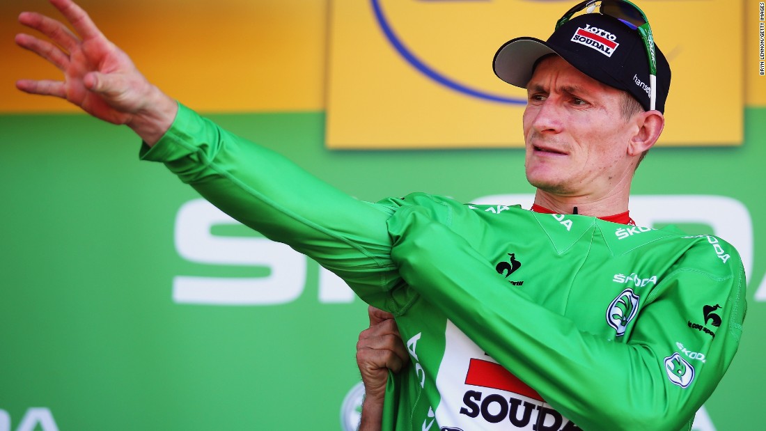 ... while Germany&#39;s Andre Greipel (Lotto-Soudal) took possession of the green (sprinter&#39;s) jersey. 