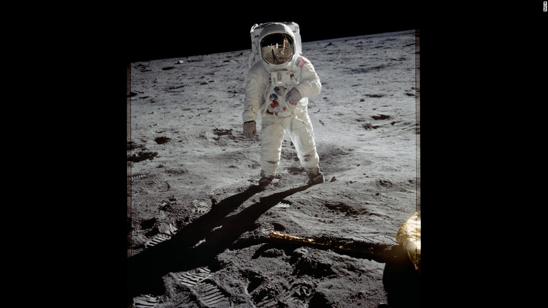 Aldrin is photographed on the moon after Armstrong went first and called it &quot;one small step for man, one giant leap for mankind.&quot; Armstrong and Aldrin explored the Sea of Tranquility region of the moon. Meanwhile, Collins remained inside the command module for the duration of the mission.