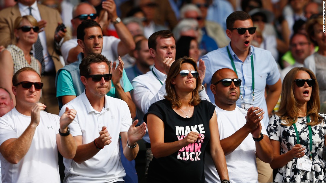 Murray was watched by his coaching team, including Amelie Mauresmo (center) and Jonas Bjorkman (2nd left). His wife Kim is far right.